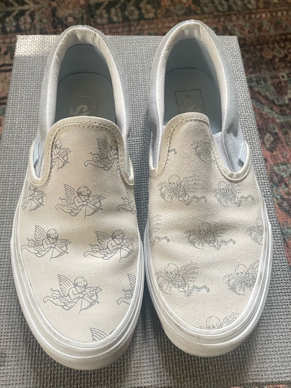 Vans “I Love You to Death” White Slip-On Sneakers with Cherub & Skeleton Print